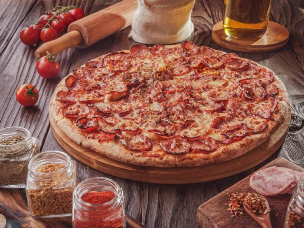 pizza with mozzarella calabrese sausage oregano pizza